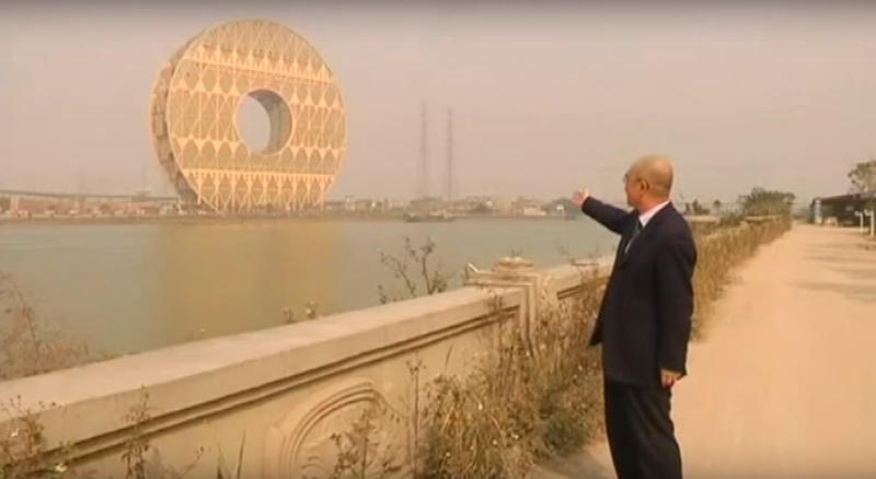The Guangzhou Circle office building has a 150-foot hole in the middle of it. Image: arbideejay1 YouTube